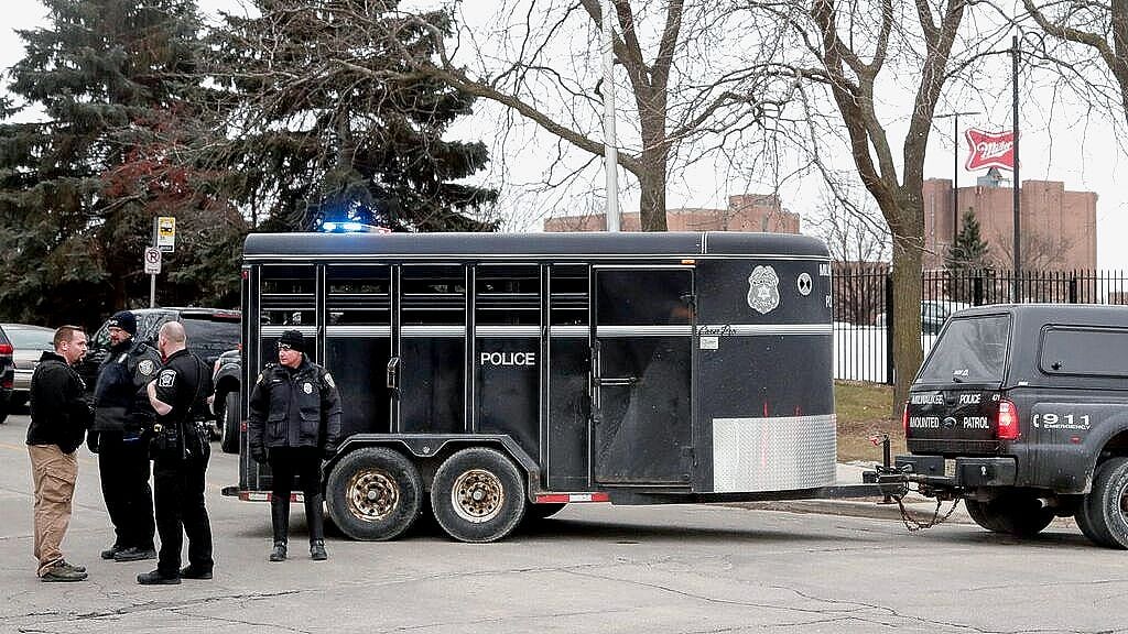 Police work outside the Molson Coors Brewing Co. campus in Milwaukee on Wednesday, 26 February 2020, after reports of a possible shooting. 