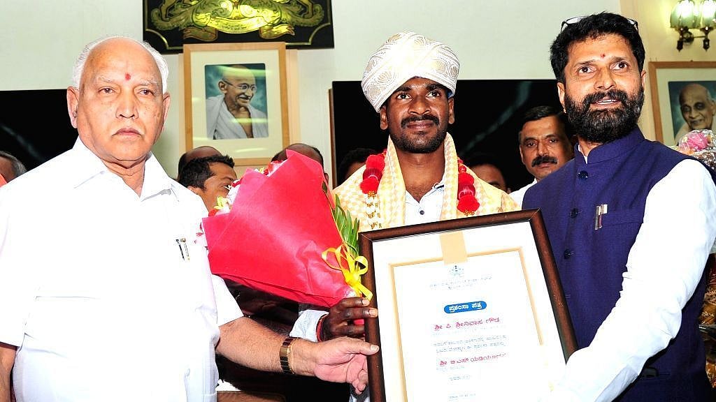 Srinivasa Gowda was handed a cheque of Rs 3 lakh by Karnataka chief minister BS Yediyurappa on Monday.