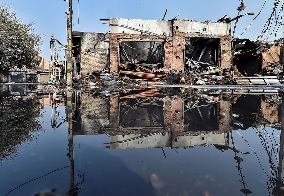 Charred remains of a vandalised property set ablaze by rioters in Gokulpuri area of the riot-affected north east Delhi, Wednesday, 26 February.