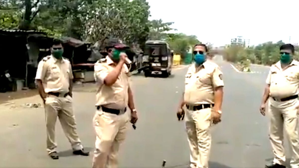 A police constable breaks into song to warm people to stay home.