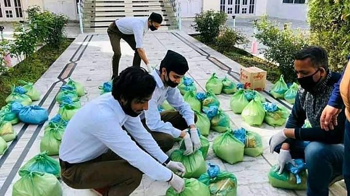 Food packages being prepared by RSS workers.