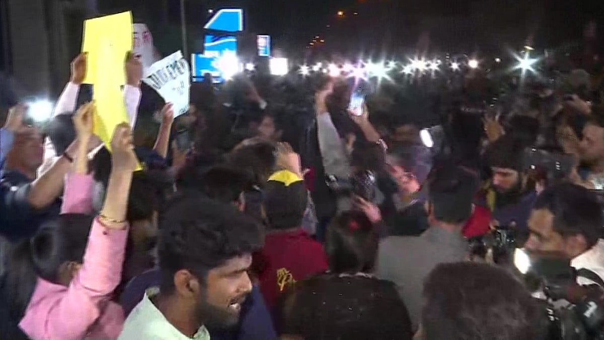 People celebrate and distribute sweets outside Tihar jail where convicts of Nirbhaya rape and murder case were hanged at 5:30 am on Friday. 