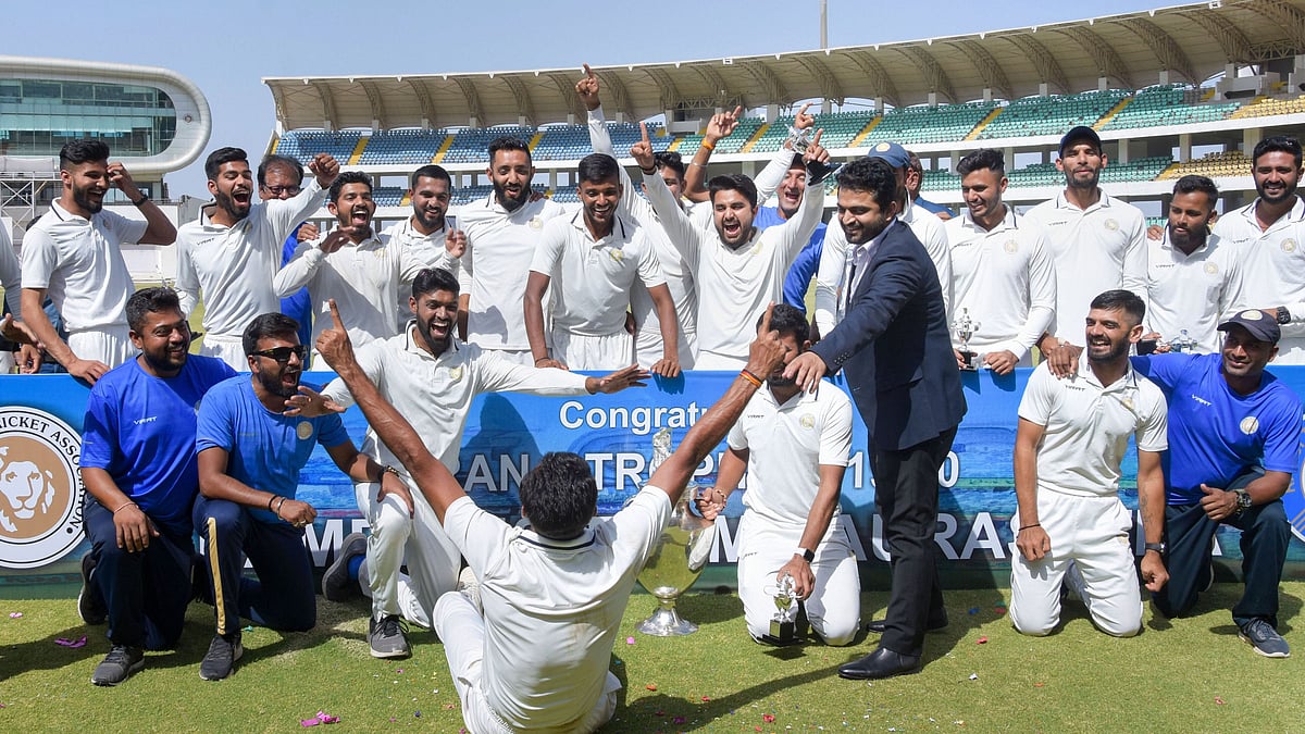 Rajkot: Saurashtra players celebrate after winning the Ranji Trophy final against Bengal in Rajkot, Friday, March 13, 2020.