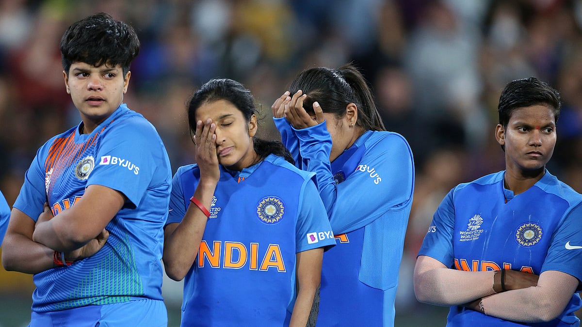 Indian players gather together after their loss to Australia in the Women’s T20 World Cup cricket final match in Melbourne, Sunday.