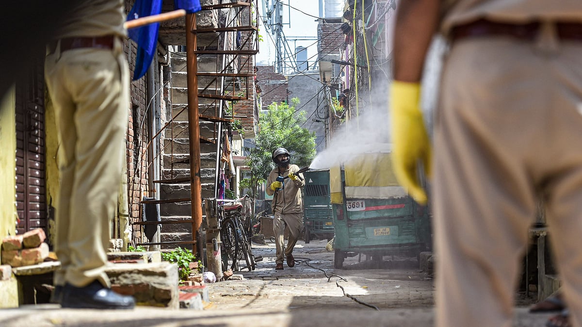 A worker sprays disinfectant at Nandgram village, marked as a COVID-19 hotspot. Image used for representational purposes.
