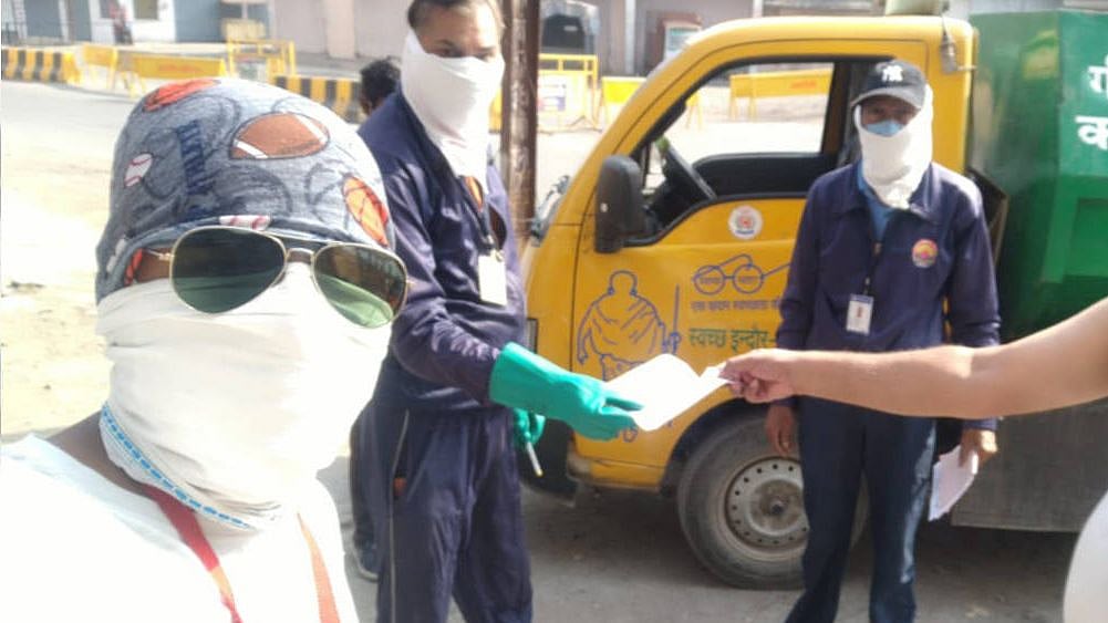 Several cities, including Surat and Ahmedabad, are delivering groceries to homes but Indore is using a new system to make this happen.