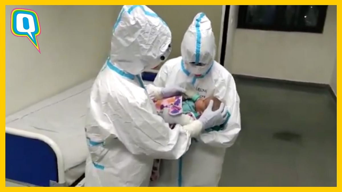 Nursing staff with a COVID positive woman’s baby.
