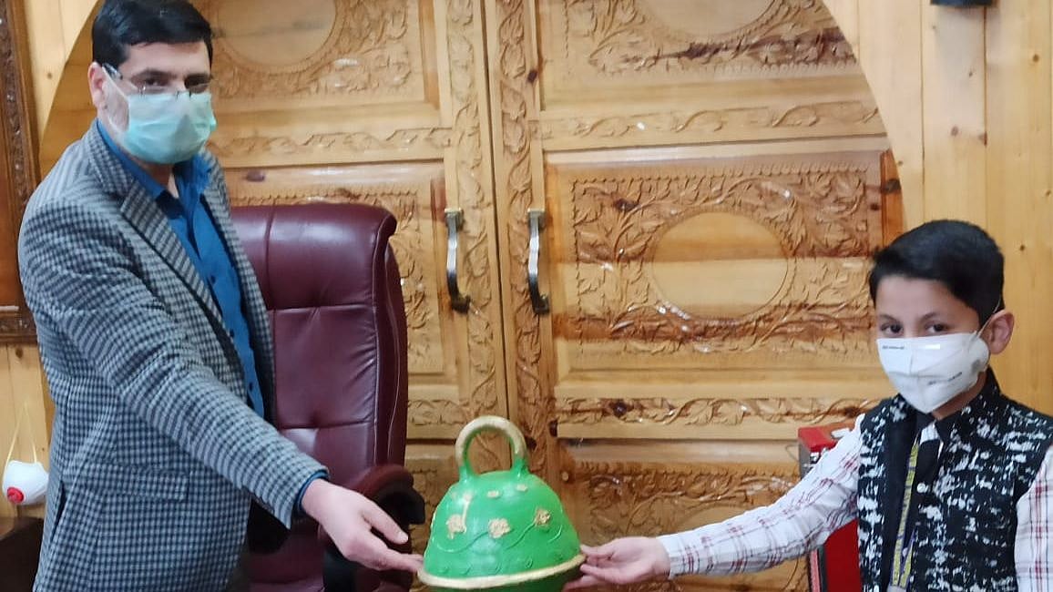 8-year-old boy donates savings for COVID-19.