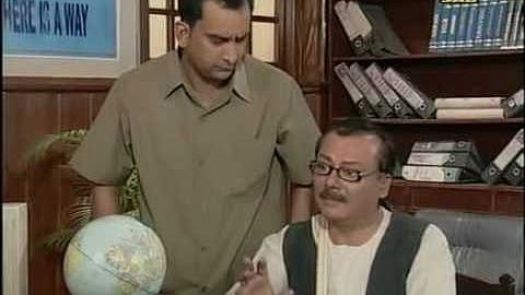A still from <i>Office Office</i>