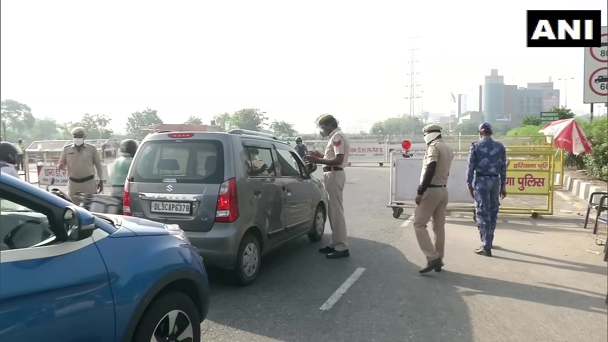 Delhi-Gurugram daily commuters being checked at the border.