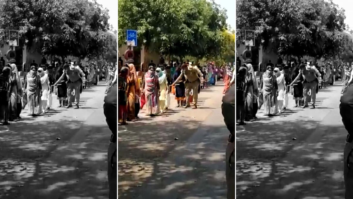 A video of a Sub Inspector allegedly assaulting two women standing in a queue for ration, by beating them with sticks  came to light on Saturday, 16 May.