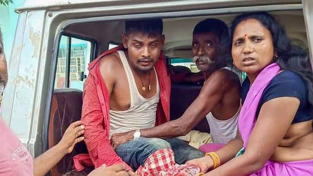 An injured villager is being shifted to a hospital after indiscriminate firing by the Nepal police at the Lalbandi-Janki Nagar border, near Saitmarhi district of Bihar on Friday, 12 June 12.