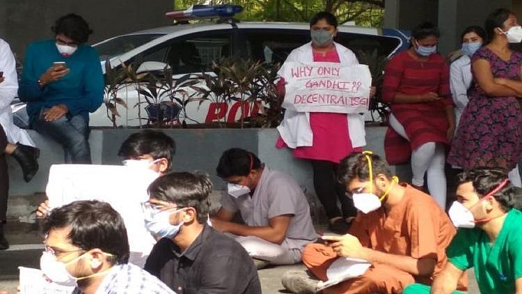 From injecting themselves with saline fluids to prevent dehydration, to not meeting family for months, Gandhi doctors are tired but a dedicated lot.