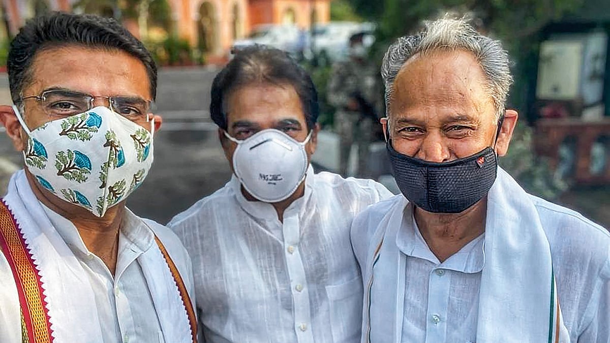 <div class="paragraphs"><p>Rajasthan Chief Minister Ashok Gehlot (R), Congress leaders Sachin Pilot (L) and KC Venugopal pose for a photograph, following the end of a month-long tussle that nearly destabilised in Rajasthan. </p></div>