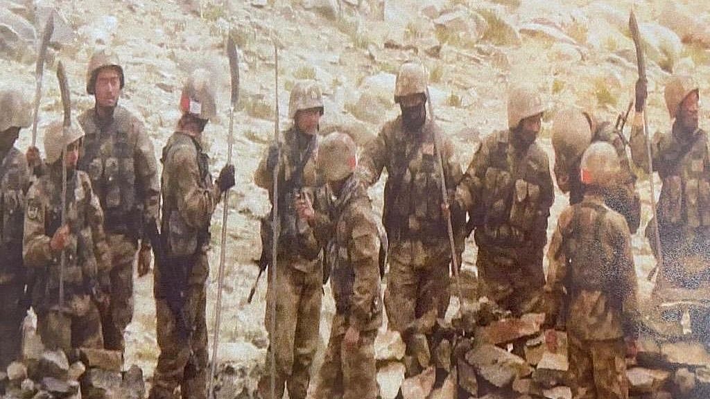 Chinese soldiers seen carrying spears & other sharp edged weapons near Mukhpari hill north of Rezang La after Monday firing incident.