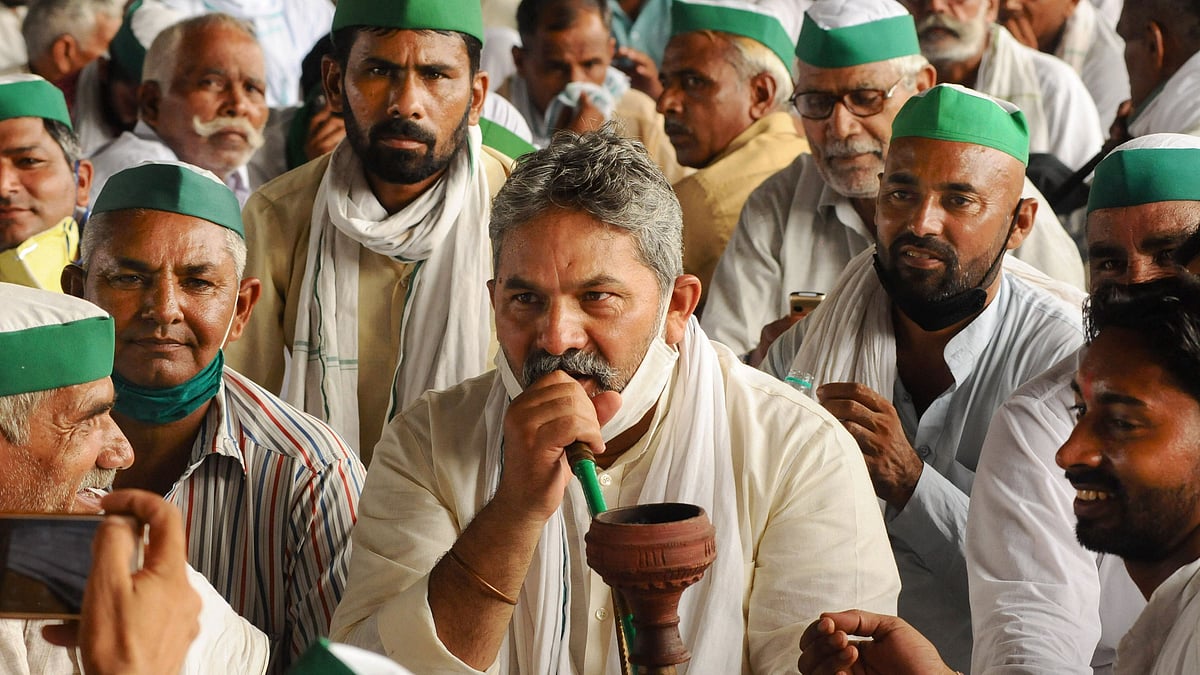 Bharatiya Kisan Union (BKU) leaders and farmers stage a protest against the central government policies on the first day of the Parliament session, at Delhi-UP border, Monday, 14 September 2020.