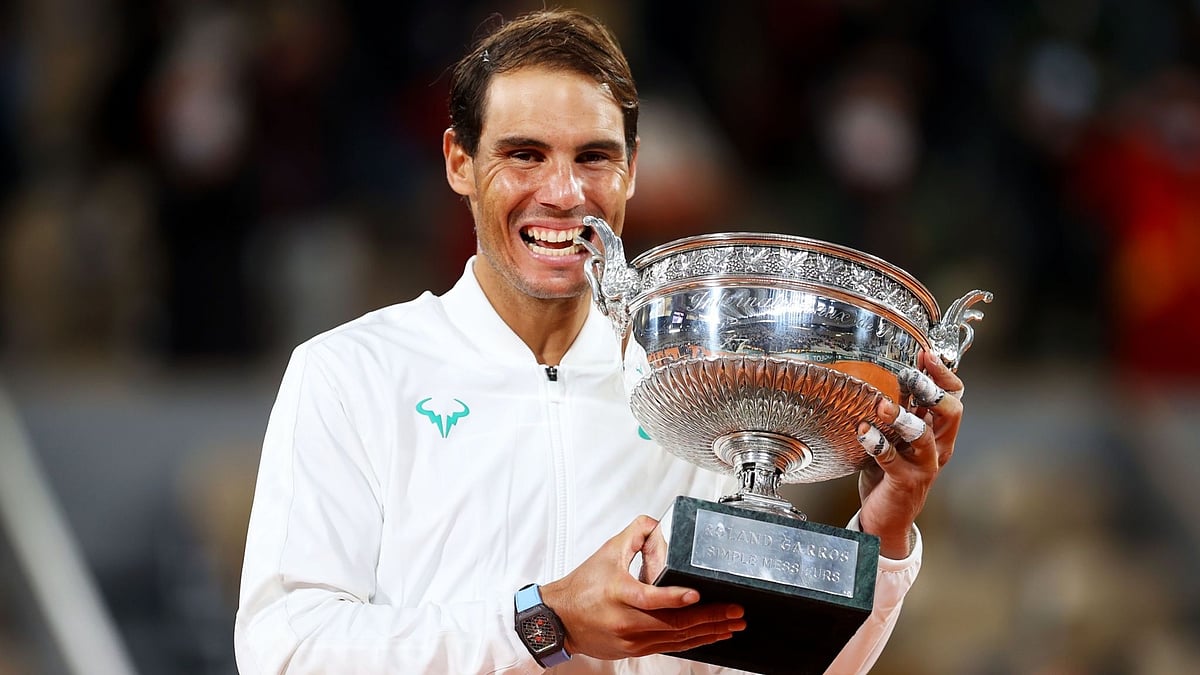 Rafael Nadal won a record-extending 13th French Open title after beating Novak Djokovic 6-0, 6-2, 7-5.