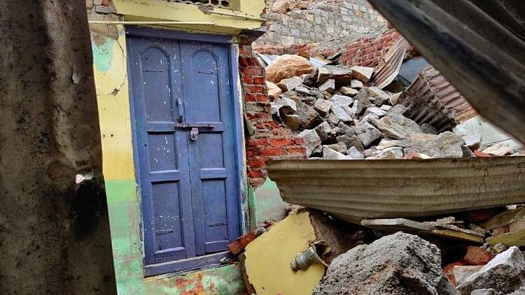 All the houses are now being vacated, as they have developed cracks, and there is a possibility of the other portions of the wall collapsing.