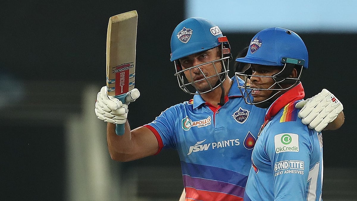 Marcus Stoinis celebrates his half century against RCB.