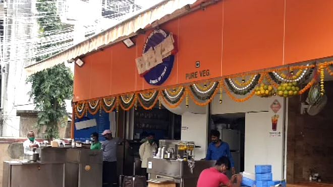 The legendary Karachi Sweets in Mumbai has covered its name with newspapers.