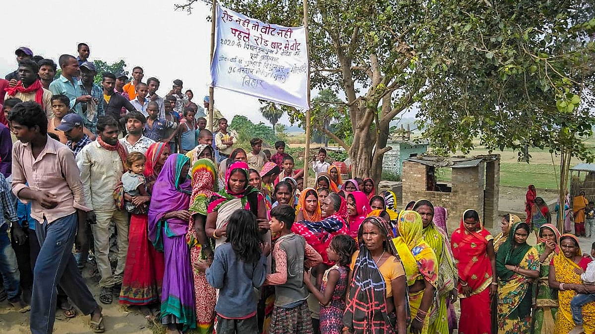 Muzaffarpur: Villagers participate in a protest Road Nahi Vote Nahi as they refuse to vote during the second phase of Bihar Assembly polls, at Baruraj in Muzaffarpur district, Tuesday, Nov. 3, 2020.