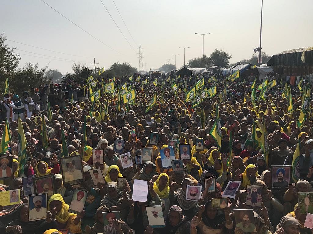 <div class="paragraphs"><p>Kin of farmers who are believed to have died by suicide, seen holding photographs of the deceased.</p></div>