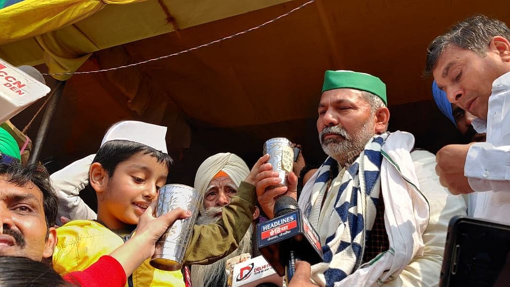 A slice of orange and water offered to Bharatiya Kisan Union leader Rakesh Tikait.