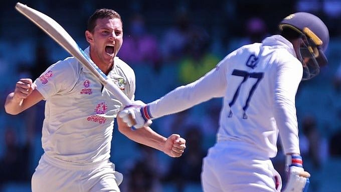 Josh Hazlewood celebrates the dismissal of Shubman Gill in Sydney. 