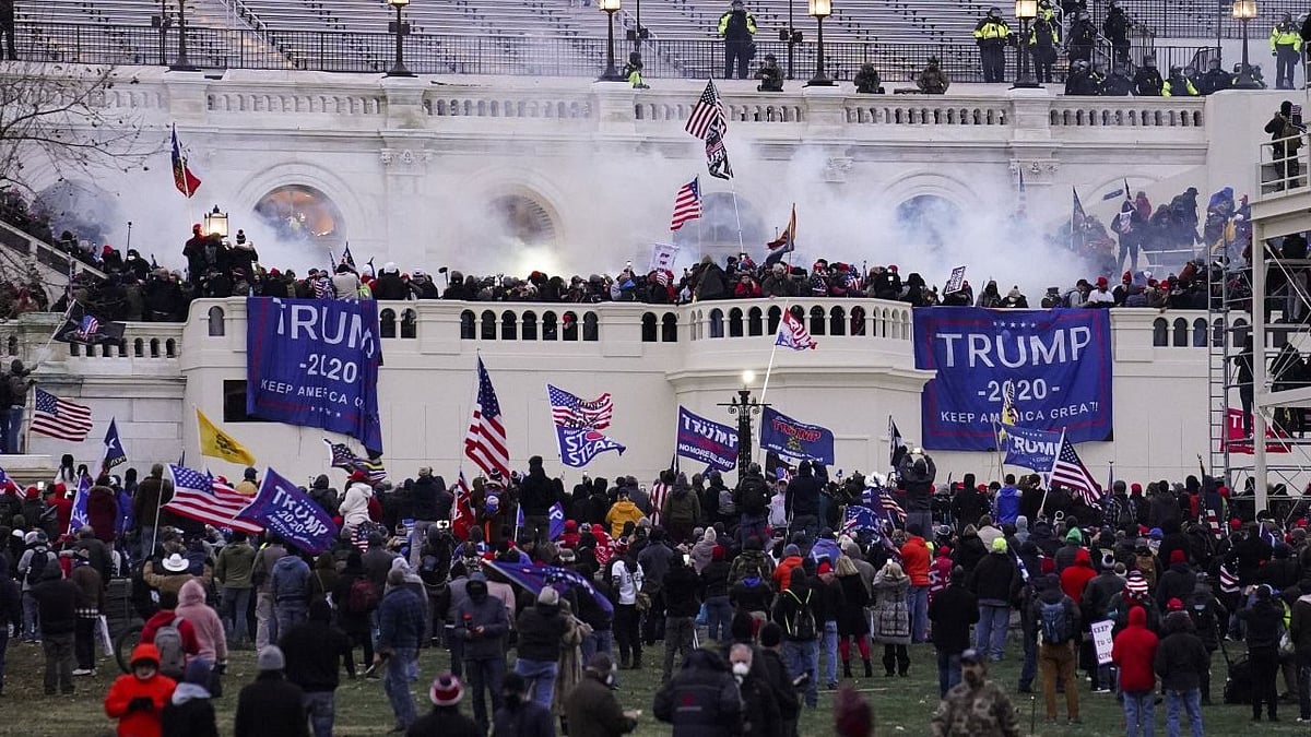 Violent protesters, loyal to US President Donald Trump, storm the Capitol on Wednesday, 6 January, in Washington. 