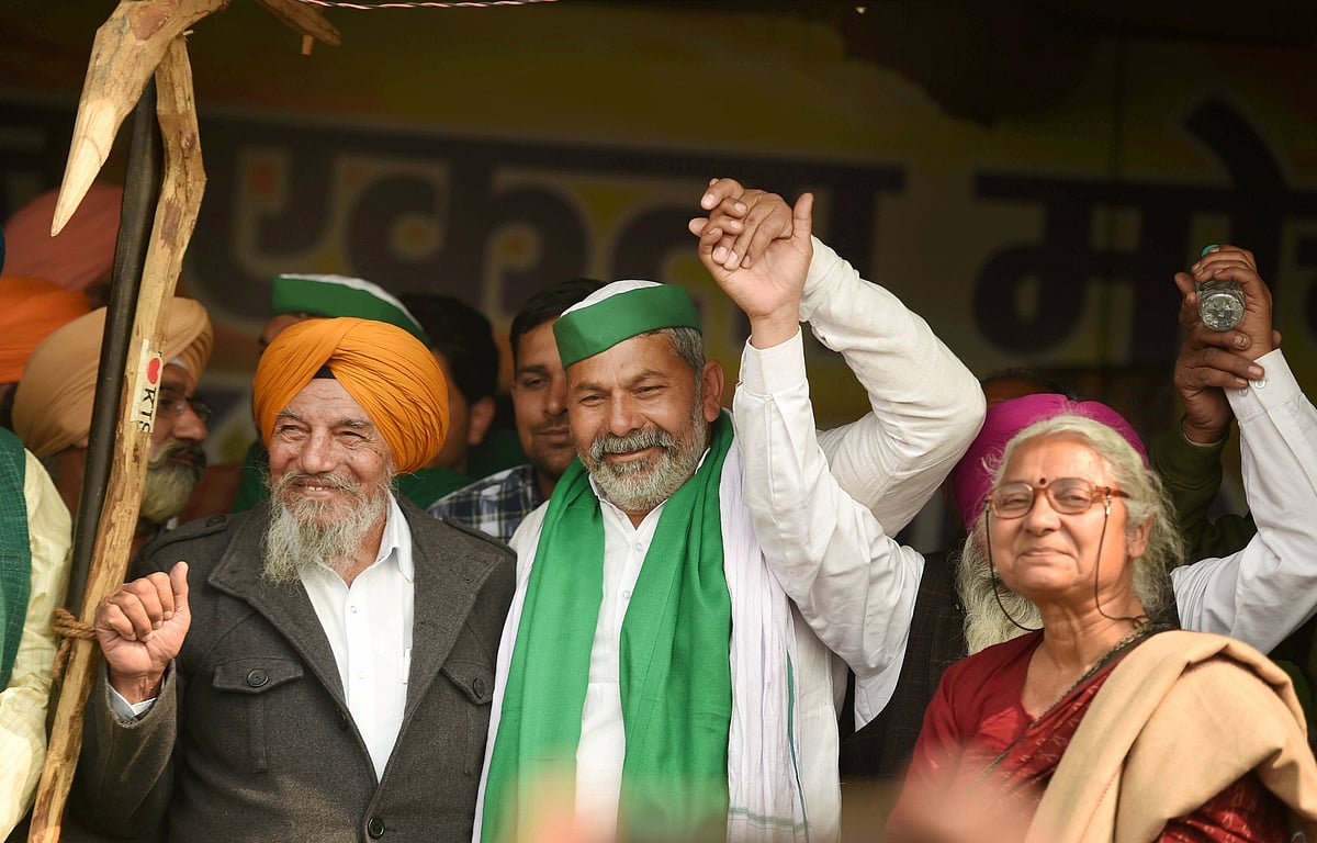 Bharatiya Kisan Union spokesperson Rakesh Tikait along with activist Medha Patkar and farmers’ leaders during the ongoing protest against the new farm laws, at Ghazipur border.