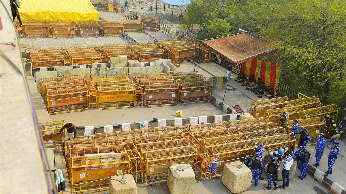 Barricading at Ghazipur border to stop farmers from marching towards the national capital, during their ongoing agitation against Centre’s farm reform laws, in New Delhi on Monday.
