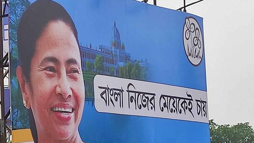 <p>The Trinamool Congress (TMC) launched its main “campaign slogan” for the upcoming West Bengal elections in a much-publicized event on 20 February.</p> <p>The new slogan- <em>Bangla Nijer Meyekei Chaaye</em>- Bengal Wants Its Own Daughter - was plastered on hoardings across Kolkata the night before.</p>