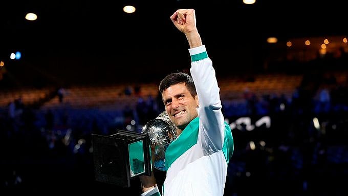 Novak Djokovic celebrates his 9th Australian Open title. 