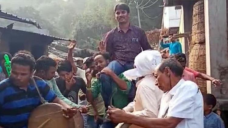 The residents washed his legs with turmeric water and carried him on their shoulders, while the rest of the locals danced to the beat of drums.
