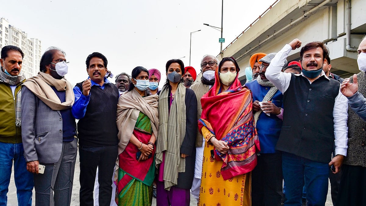 Shiromani Akali Dal leader Harsimrat Kaur Badal, Nationalist Congress Party (NCP) leader Supriya Sule, Dravida Munnetra Kazhagam (DMK) leader Kanimozhi Karunanidhi and other opposition leaders during their visit to Ghazipur border, in solidarity with farmers’ agitation against the Centre’s farm reform laws.