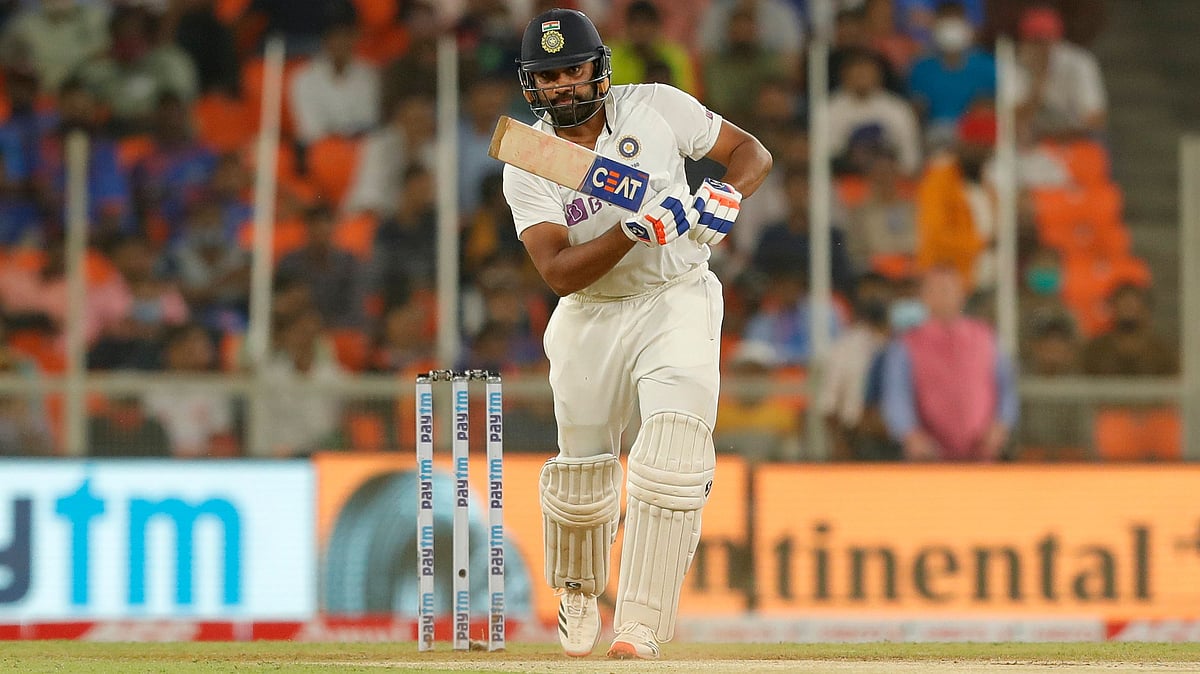 Rohit Sharma drives for a boundary during the first innings of the Pink Ball Test against England at Ahmedabad.&nbsp;