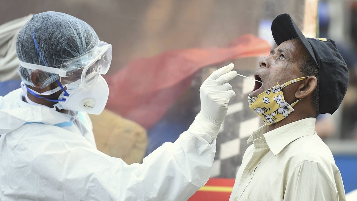 A health worker conducts COVID-19 testing. Image used for representation.