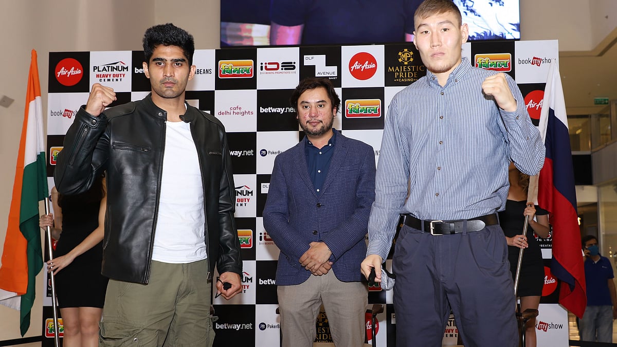 Vijender Singh and Artysh Lopsan at the announcement of their bout in New Delhi. 