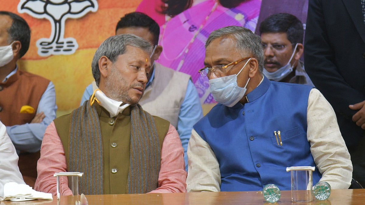 New Uttarakhand CM Tirat Singh Rawat with former CM Trivendra Singh Rawat on Wednesday, 10 March.