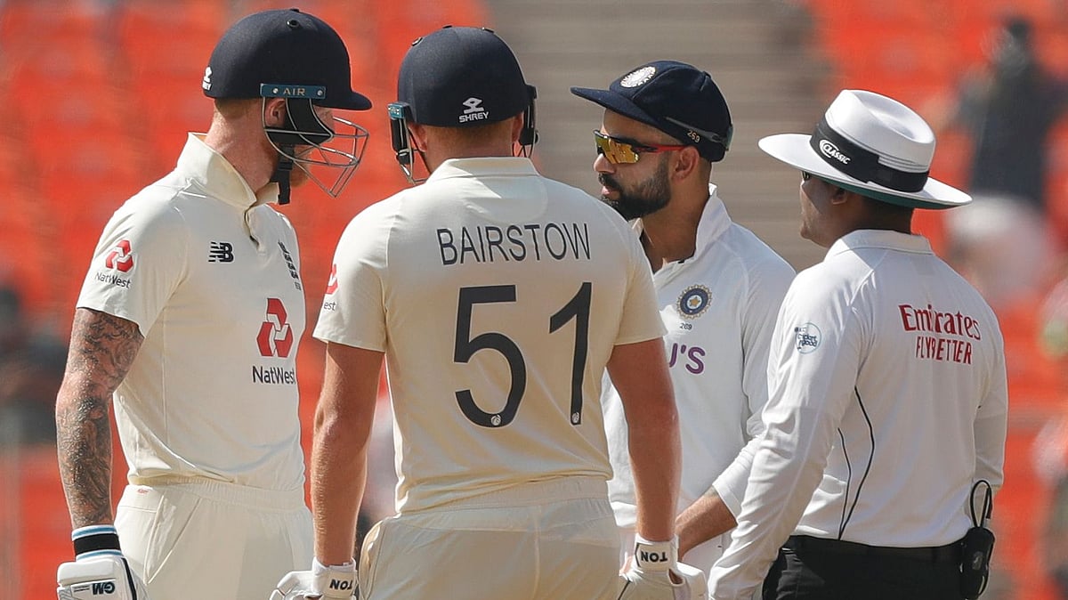 Ben Stokes and Virat Kohli have a heated conversation mid-pitch.&nbsp;