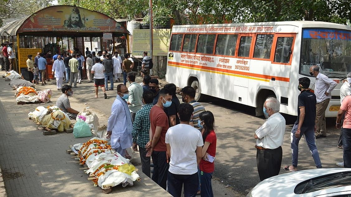 Families of the deceased have lined up outside crematoriums as they await their turn