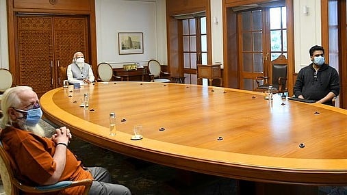 <div class="paragraphs"><p>Actor Madhavan with PM Narendra Modi and Nambi Narayanan.</p></div>
