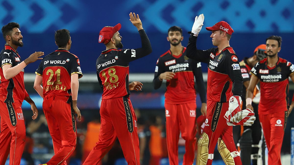 Royal Challengers Bangalore players celebrates after winning the match 6 of the Vivo Indian Premier League 2021 between the Sunrisers Hyderabad and the Royal Challengers Bangalore.
