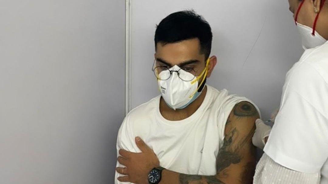 Virat Kohli takes the first shot of the COVID-19 vaccine. 