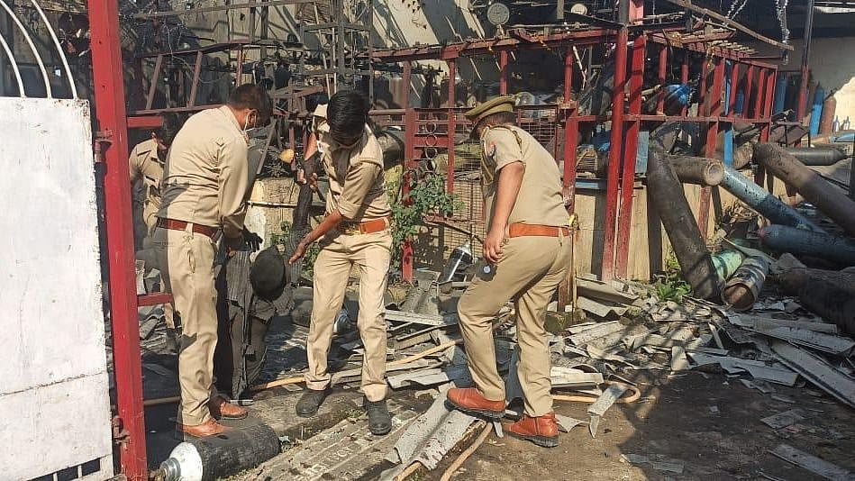 Cops at the blast site on Wednesday.