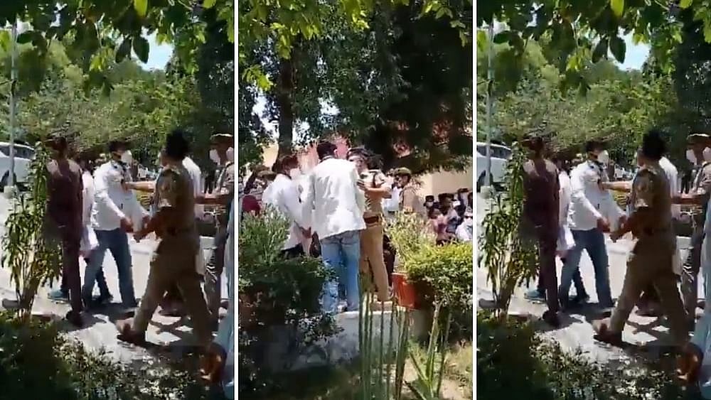 In photo, doctors being taken into custody by Jhansi police at Maharani Laxmibai Medical College.