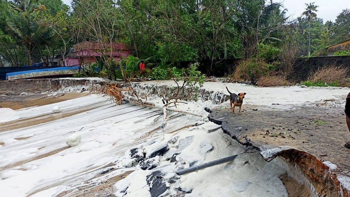 Damaged road due to rough sea weather conditions owing to Cyclone Tauktae in the Arabian Sea, in Alappuzha