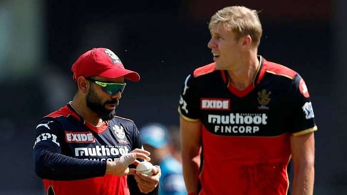 Virat Kohli and Kyle Jamieson during IPL 2021