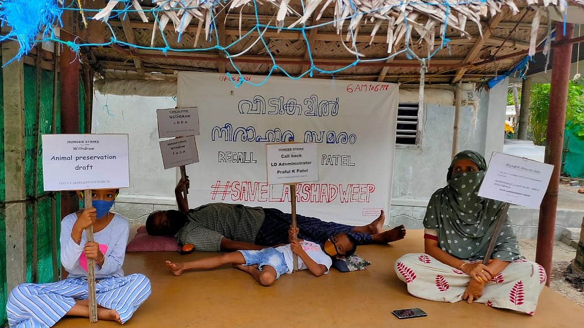 Adhering to COVID-19 norms, people protested indoors, holding placards with strong slogans condemning the actions of the Lakshadweep administrator.