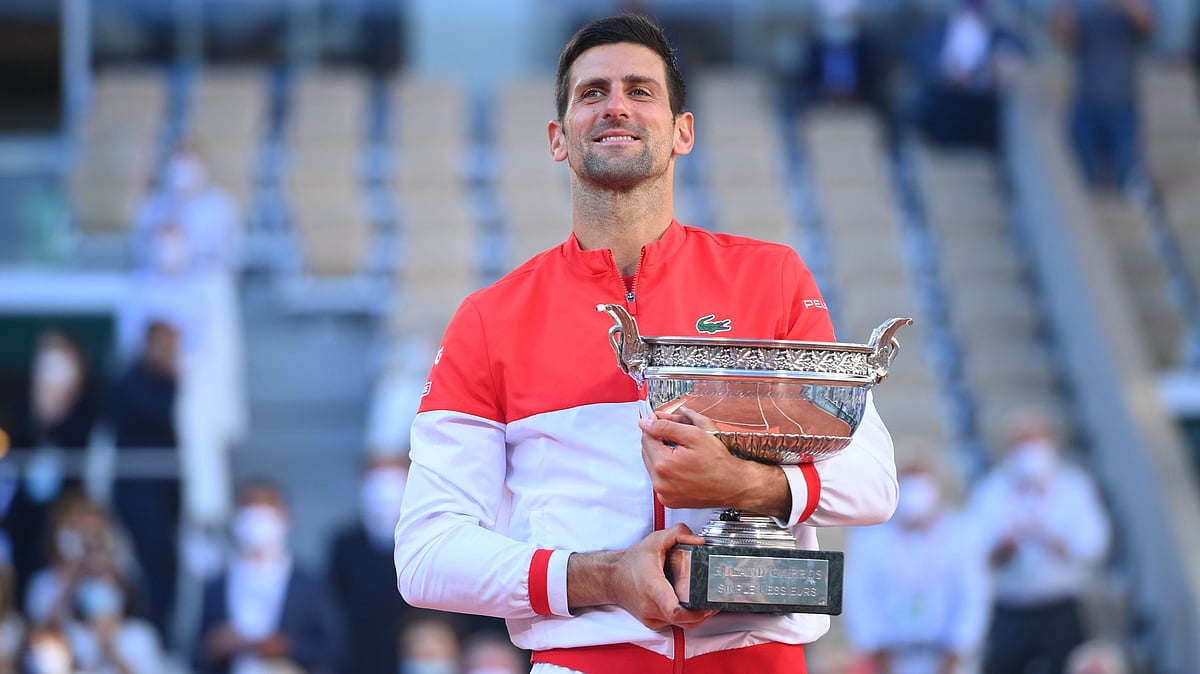 Novak Djokovic with the French Open trophy. It is his 19th Grand Slam title. 